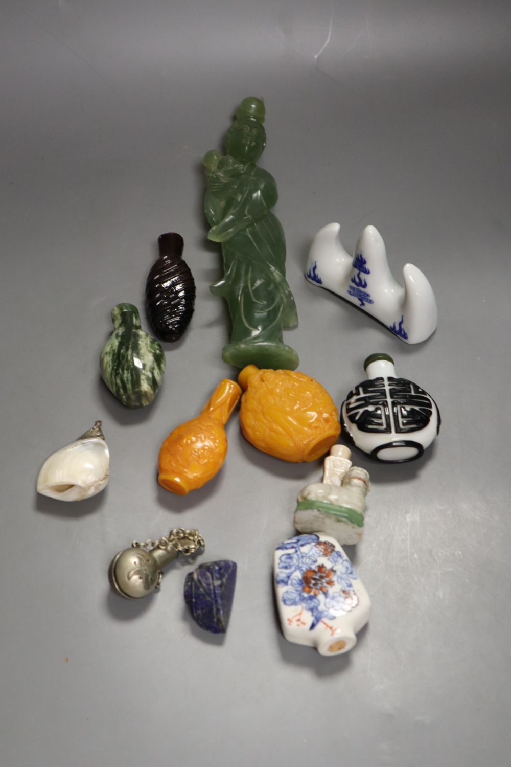 Snuff bottles and hardstone figure, 23cm